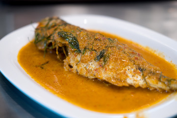 Fried fish with red curry paste
