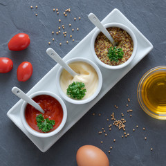 Fast food sauces: ketchup, mustard and mayonnaise
