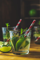 Mojito, fresh alcoholic cocktail with lime, ice and mint