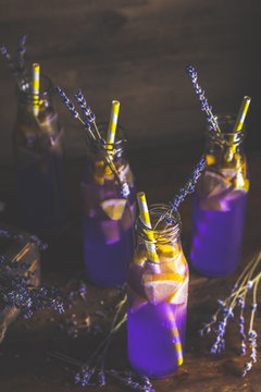 Fresh lavender violet cocktail with lemon and ice