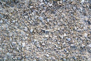 Тexture of white limestone crushed stone of various sizes.