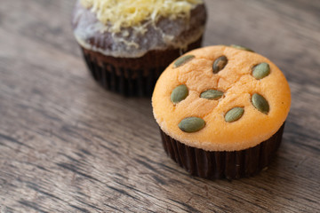 Mamon cake or cupcake on wooden desk background