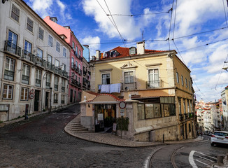 Fototapeta na wymiar Lisbon - Portugal, narrow streets and winding climbs in the ancient and popular Alfama district
