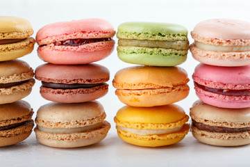 Set of different multi-colored macarons or macaroon cookies. colorful almond cookies, french sweet delicacy. Close-up.
