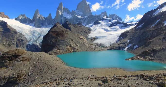 Pull Back Aerial View of Fitz Roy and Laguna de los Tres with Hikers, Los Glaciares National Park, Patagonia, Argentina