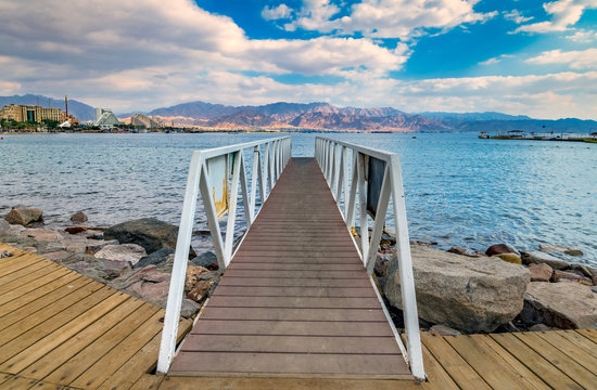 Morning view on the gulf of Aqaba from the central beach of Eilat - famous tourist resort and recreational city in Israel