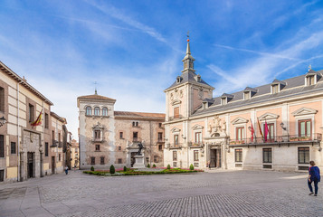 Fototapeta na wymiar Madrid, Spain. Plaza de la Villa: on the left is Torre de los Lujanes, in the center is Casa Cisneros House, on the right is the Town Hall (Casa de la Villa)
