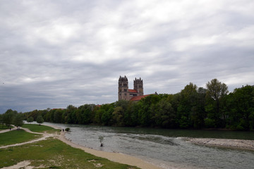 Fototapeta na wymiar St. Maximilian church, view from from Izara river. Munich, Germany.