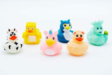 A group of rubber ducks on an isolated background