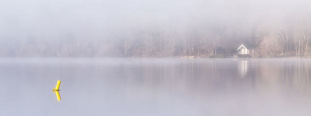 Obraz na płótnie Canvas Ullswater lake in the mist Lake district cumbria england uk 