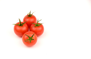 Fresh cherry tomatoes on white background with space for text.