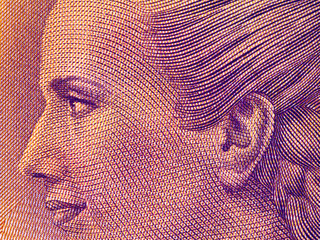Eva Peron portrait on Argentine 100 peso (2017) banknote close up macro. Popular political leader of Argentina.