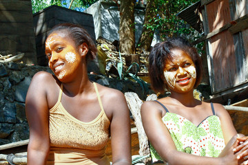 Woman with traditionally painted face, Madagascar