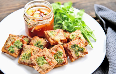 Fried toasts with Minced Pork Spread with chili sauce (Thai Pork Toast) . Toasts Menu for children.