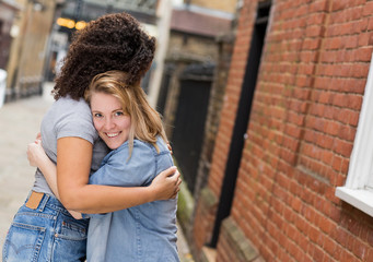 Lesbian couple hugging each other