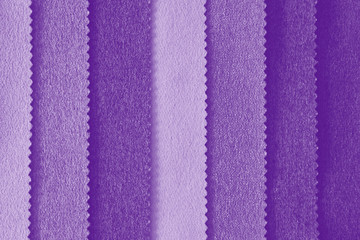 Elegant violet textile background. Silk cloth texture. Fabric pattern.
