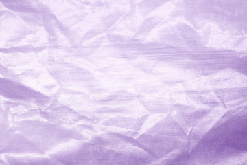 Elegant violet textile background. Silk cloth texture. Fabric pattern.