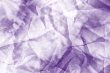 Elegant violet textile background. Silk cloth texture. Fabric pattern.