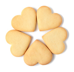 Homemade heart shaped cookies on white background, top view