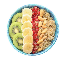 Bowl of quinoa porridge with peanuts, kiwi, banana and pomegranate seeds on white background, top view