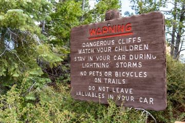 Warning sign posted at Bryce Canyon National Park informs tourists of dangerous conditions on the trails