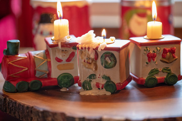 3 sections of candle holder train with wax melting 