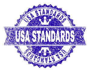 Obraz premium USA STANDARDS rosette seal overlay with grunge style. Designed with round rosette, ribbon and small crowns. Blue vector rubber watermark of USA STANDARDS text with dirty style.