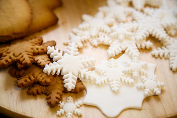 Cookies with icing. Christmas cookies in the shape of snowflakes.