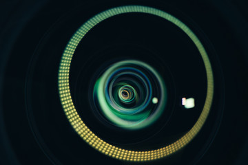 Abstract reflection on camera lens front element