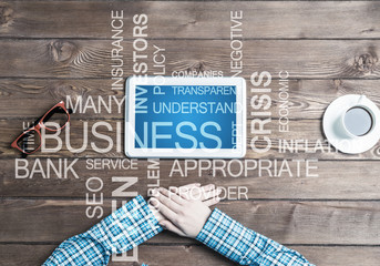 Close view of woman in checked shirt at her workplace