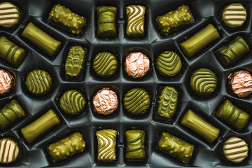 Green chocolate candies in the box
