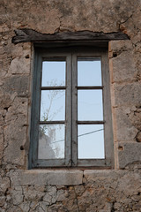 old window with wooden lintel