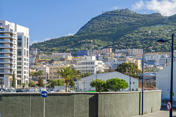 Rock of Gibraltar and a densely populated town area at the foot of it