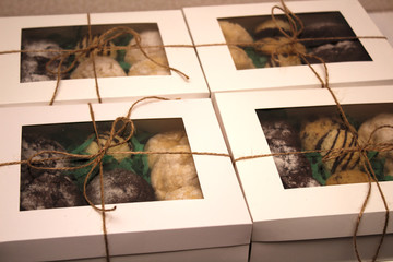 packed boxes with cookies tied with rope