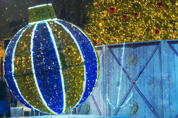 New Year's big toy New Year's ball on the street from a garland and lights