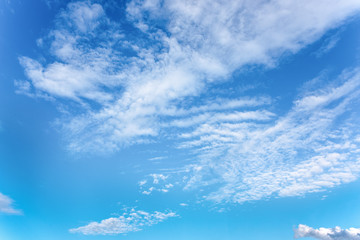 White clouds on background of blue sky.