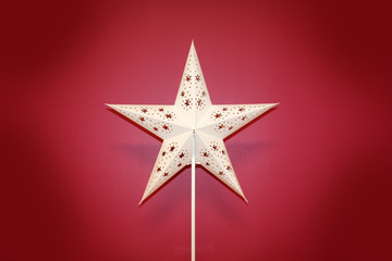 White star on red background.	