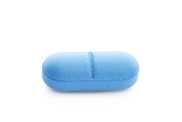 Color pill on white background. Medical treatment