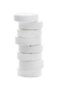 Stack of pills on white background. Medical treatment