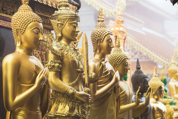 Golden buddha statue in Chiang Mai Wat Phra Doi Suthep temple
