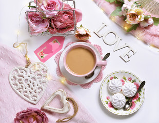 romantic style flat lay with coffee and roses