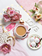 romantic style flat lay with coffee and roses