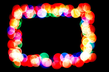 colorful circles form a frame.bokeh circle isolated on black background.frame of circles.