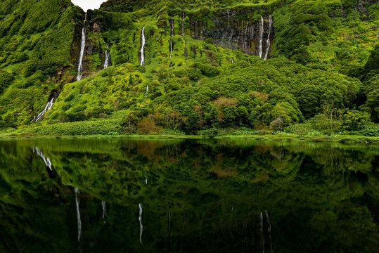 Waterfalls with lake Poco Ribeira do Ferreiro in green landscape, Poco da Alagoinha, Fajazinha, Flores Island, Azores, Portugal, Europe