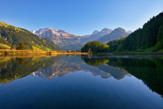 Lake Lenkerseeli with view to the Wildstrubel in the evening light, Lenk, Simmental, Canton Bern, Switzerland, Europe