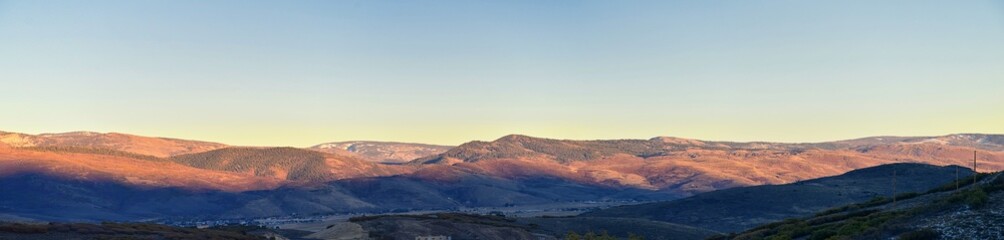 Fototapeta premium Panoramic Landscape view from Kamas and Samak off Utah Highway 150, view of backside of Mount Timpanogos near Jordanelle Reservoir in the Wasatch back Rocky Mountains, and Cloudscape. America.