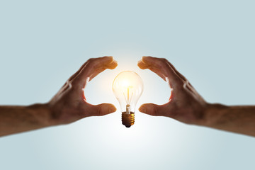 Glass bulb in hands