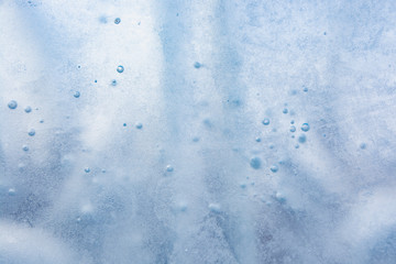 Obraz premium The texture of the ice. The frozen water.Winter background 