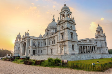 Fototapeta na wymiar Historic Victoria Memorial Kolkata exterior architecture structure at sunrise.