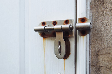 old lock on wooden door
